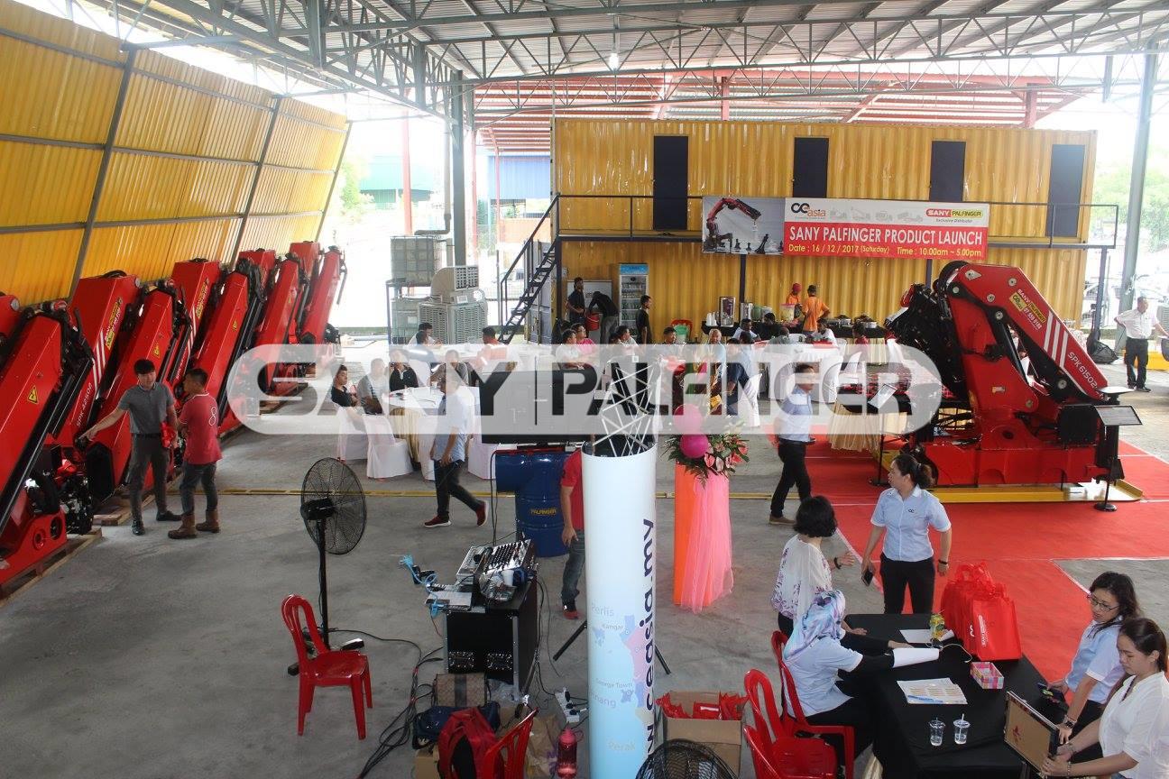 Guests looking at the various Sany Palfinger products on display. 