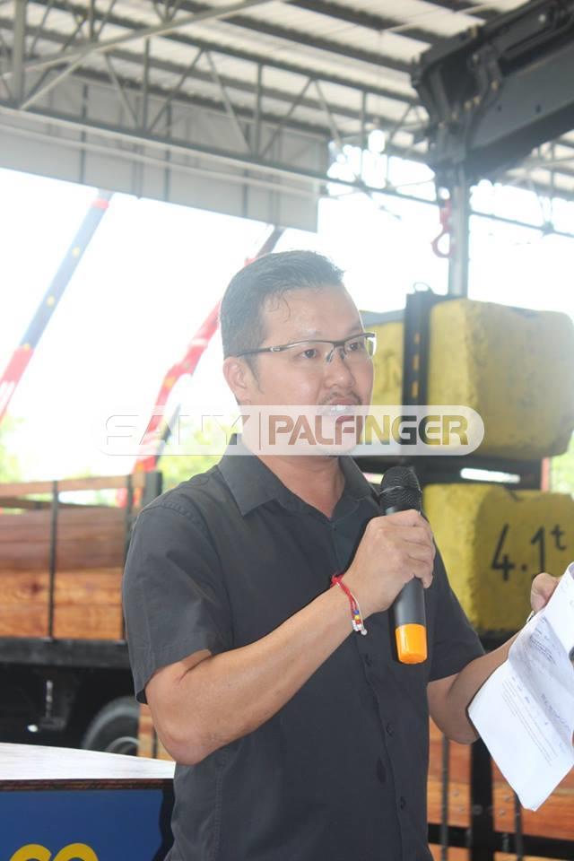  Steven Chan, Service Manager of Palfinger Asia Pacific Pte Ltd giving more information during the live crane demonstration.